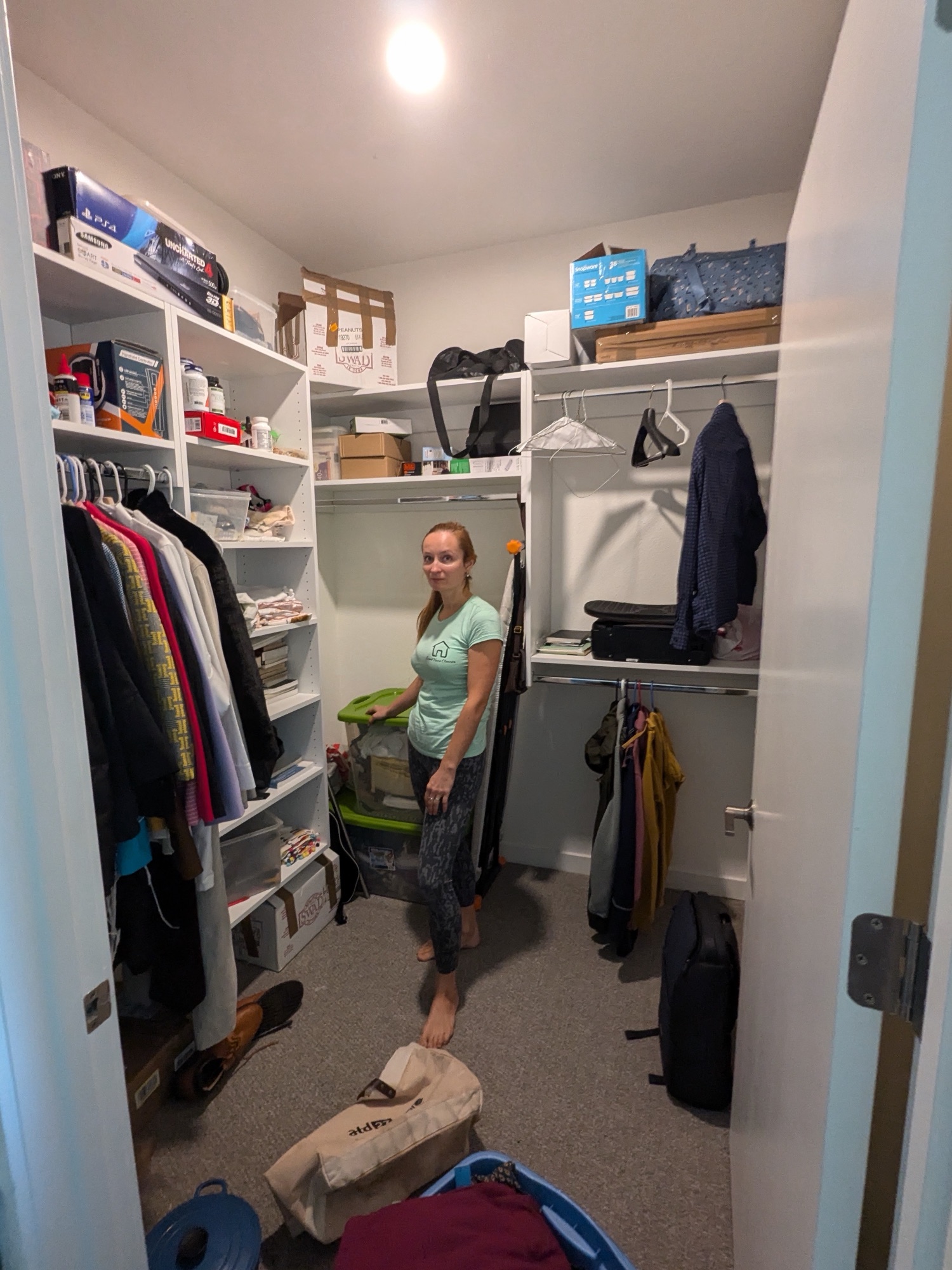 A cleaner working through a closet as part of a move-out clean
